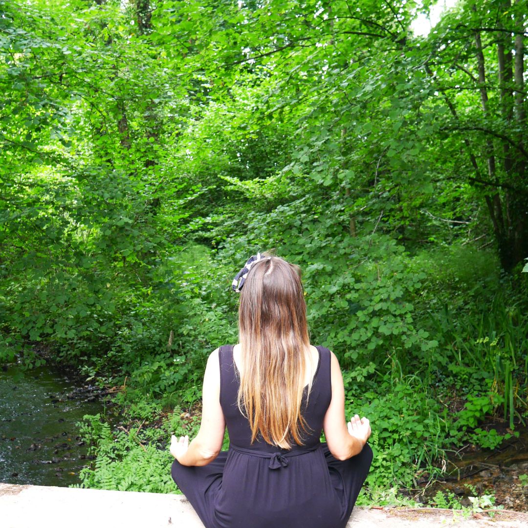 meditating by river